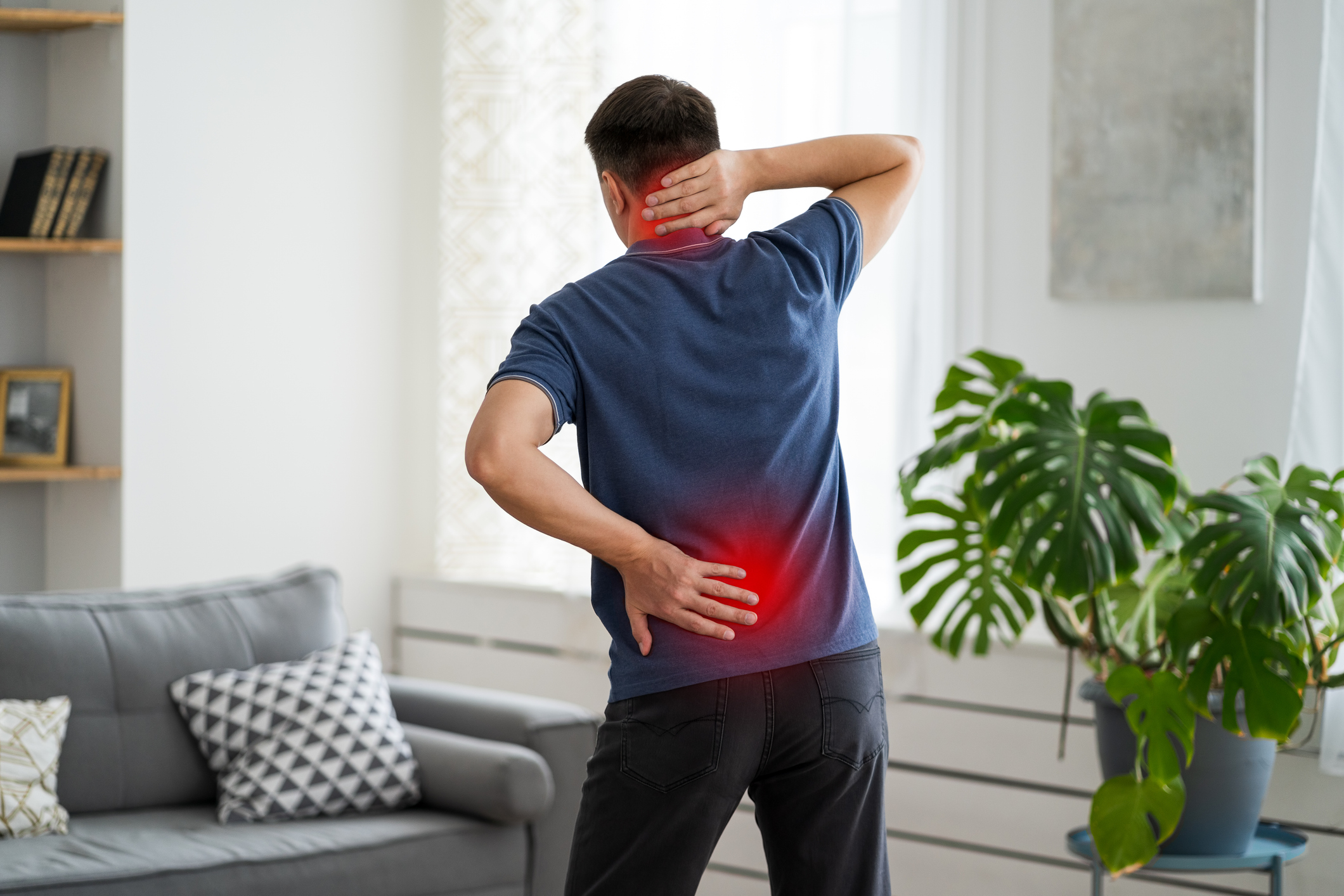 man with neck and back pain